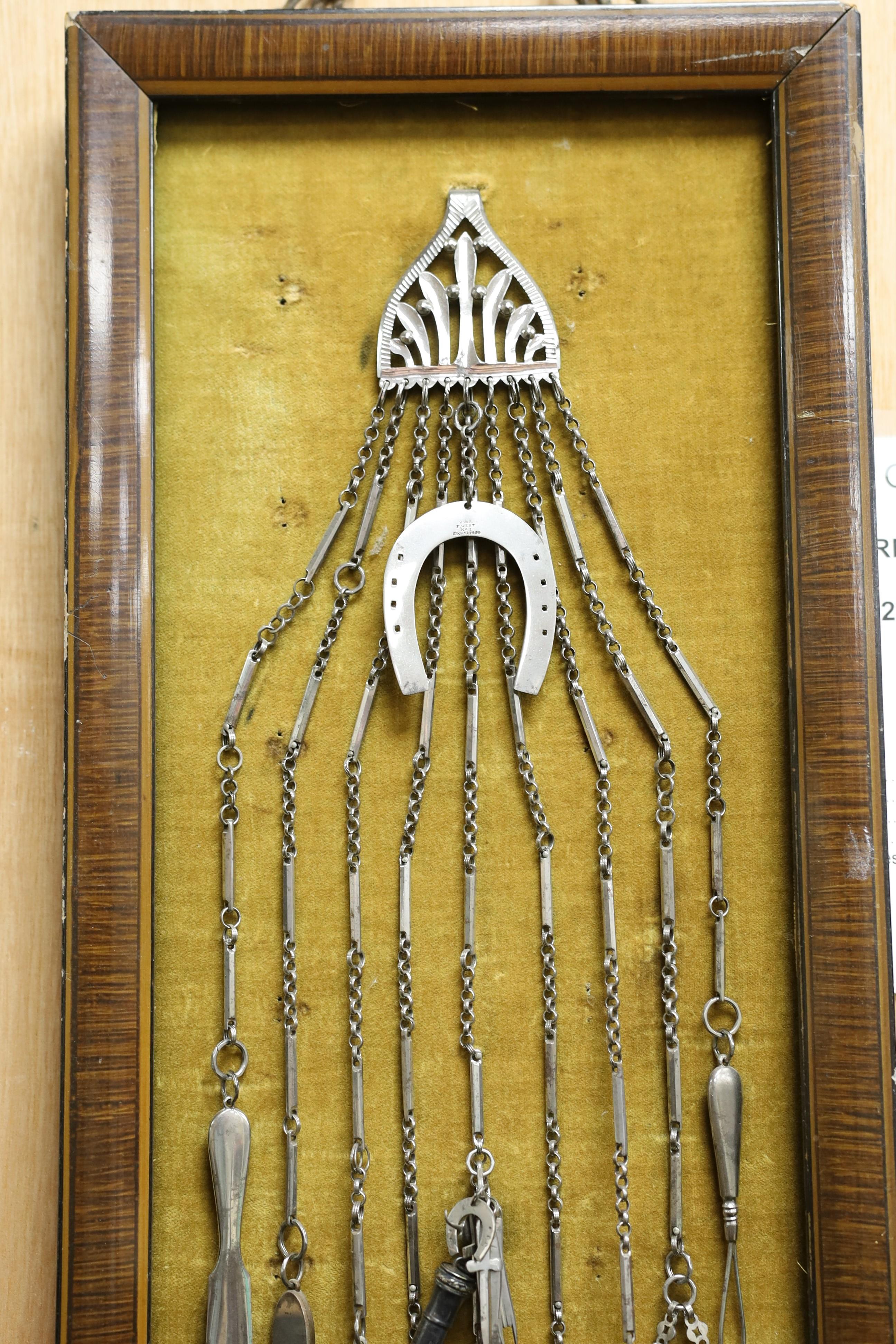 A wall mounted presentation chatelaine